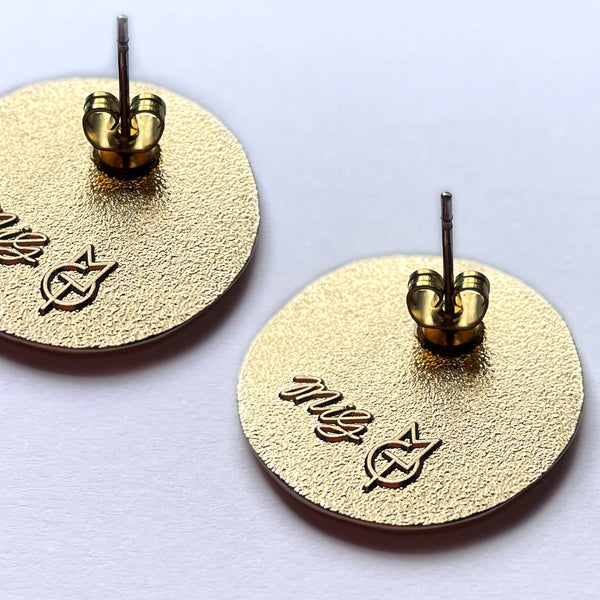 Metal face earrings on sale